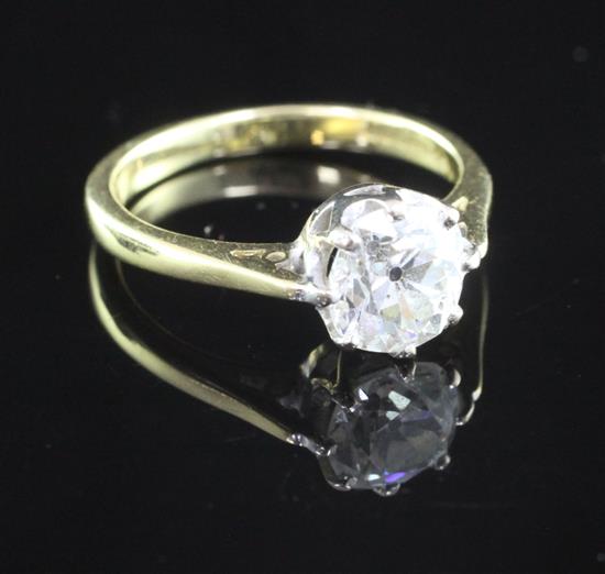 An 18ct gold and solitaire diamond ring, size L.